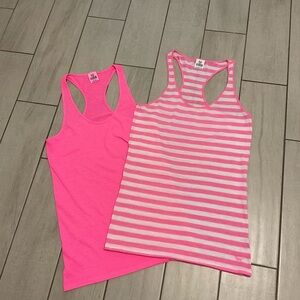 Victory Secret’s striped racer back tanks . Size Large. Pink& white stripes.B